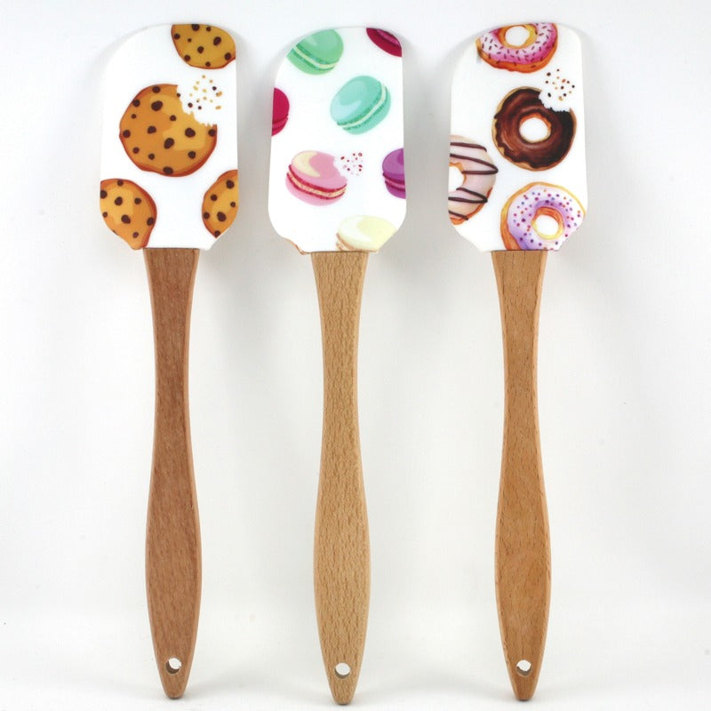 Spatule en silicone à motif macarons