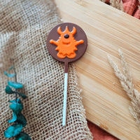Sucette artisanale d'Halloween au chocolat au lait 25g