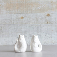 Assortiment de salière et poivrière en forme de poisson