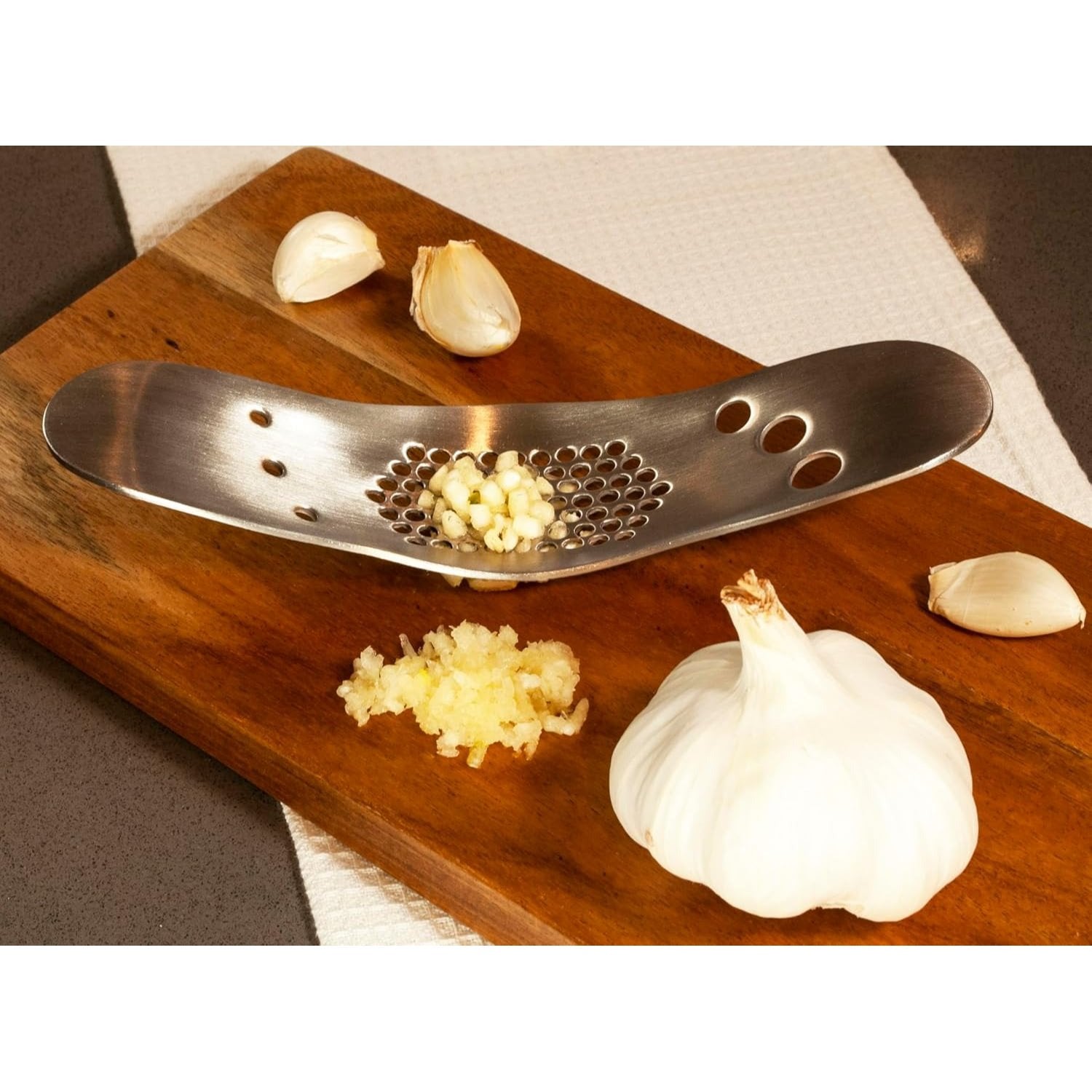 Stainless Steel Garlic Rocker with Built-in Herb Stripper