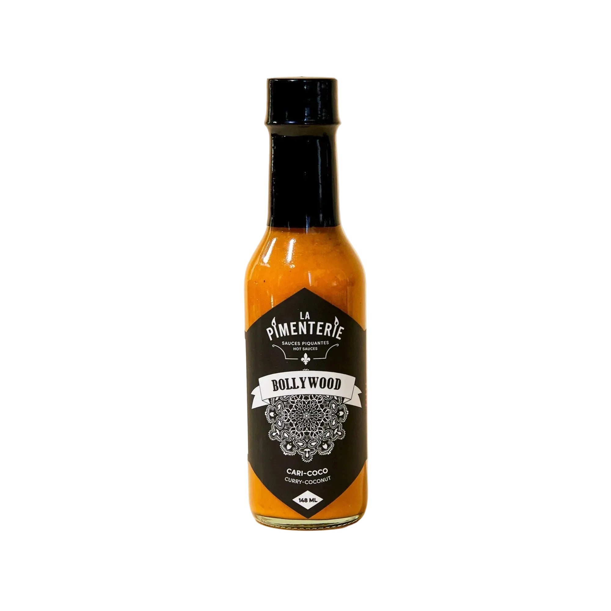 Bottle of La Pimenterie Bollywood curry coconut sauce on a white background