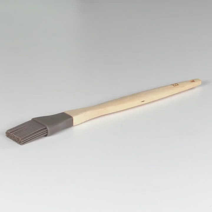 Pinceau en silicone et en bois de hêtre